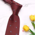 Burgundy silk tie for men, detailed view with cute dolphin pattern and elegant business style. - Style S