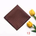 Detailed closeup view of the brown pocket square featuring elegant floral pattern and white dots. - Pocket Squares 13