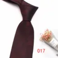Detailed view of burgundy men's business jacquard tie with vintage leaf pattern design. - No.017 Wine Red Leaf