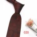 Detailed view of the dark brown jacquard business necktie featuring elegant plant leaf pattern. - No.020 Dark Brown Plant