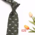Dark green horse pattern necktie detail shot featuring elegant equine print and tulip prop. - Style 025
