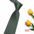 Elegant dark green necktie with red polka dots, classic style for business or formal wear. - Color 005