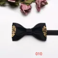 Black groom bow tie with gold Chinese double happiness symbol for wedding suit, detail view. - Black