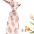 Close-up detail of the elegant pink jacquard feather pattern necktie for men's business wear. - Light Pink