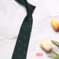 Dark green men's business tie featuring a delicate fox pattern, elegant detail shot. - 8cm 002