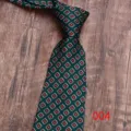 Klassieke donkergroene herenstropdas met een elegant rood en wit bloemig geometrisch patroon. - Kleur 004