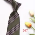 Detailed close-up of an elegant olive green striped necktie with classic diagonal lines. - 017