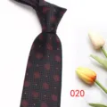 Men's business formal necktie with classic red floral medallion pattern on dark fabric. - Color 020