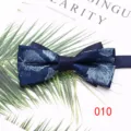 Detailed view of the dark blue floral printed mens bow tie, elegant accessory. - Color 010