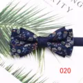 Detailed view of the navy blue double layer floral woven men bow tie with exquisite design. - Color 020