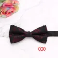 Detail shot of stylish black mens bow tie featuring red print, clean texture for formal wear. - Color 020