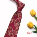 Burgundy silk-like necktie with elegant gold paisley pattern detail for men and women. - Color 021