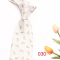 Elegant men's jacquard necktie with feather pattern, perfect for business and formal wear. - Light Beige