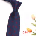 Blue men's business formal tie with elegant red feather jacquard pattern detailed view. - Blue