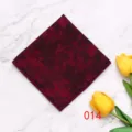 Detail view of men's dark red geometric polyester pocket square, elegant suit accessory. - Color 014