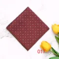 Detailed view of a red geometric pattern polyester pocket square for men suit styling. - 017