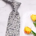 Classic men's silk tie with elegant blue leaf pattern, stylish accessory for business and casual wear. - Blue Leaf Print (013)