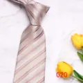 Detailed shot of light champagne men's business casual tie with stylish diagonal stripes. - Champagne Diagonal Stripe (020)