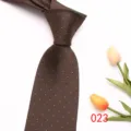 Brown necktie detail with white polka dots and elegant tulip prop on clean white background. - 023 (Dark Brown Polka Dot)