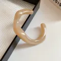Acrylic irregular open bangle detail shot, minimalist style beige resin bracelet showcase. - Bangle-Light Coffee