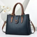 Vintage dunkelblaue Handtasche mit Krokodilprägung und braunen Griffen - 30 x 12 x 23cm / Blau