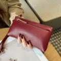 Red genuine leather women long clutch bag, large capacity wallet and phone pouch with strap. - Burgundy