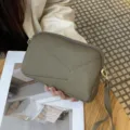 Damen Umhängetasche aus echtem Leder, kleine mode Handtasche und Armbandtasche für Alltag. - Elefantengrau (Clutch-Modell)
