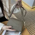 Grey genuine leather women crossbody shoulder bag with geometric panel design and strap. - Elephant Grey (Clutch with Shoulder Strap)