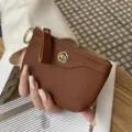 Compact genuine leather coin purse with zipper, key ring and vintage floral metal rivet. - Caramel color