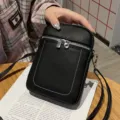 Black genuine leather mini phone crossbody bag for women, stylish small shoulder bag variant. - Black