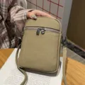 Echtleder Mini Handy Umhängetasche für Damen, stilvolle khakifarbene kleine Schultertasche. - Grau