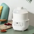 Automatic electric stew pot for home kitchen use with clear lid and digital control panel. - White (Double Layer)