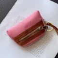 Mini leather coin purse with zipper and keychain, compact multi-functional card wallet. - Pink