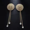 Rhinestone tassel pasties detail close up, sparkling crystal body jewelry accessories. - One Size / Gold