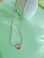 Silver tennis chain choker necklace with pink heart crystal pendant, stylish jewelry. - Pink
