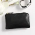 Black leather mini coin purse with zipper, compact and stylish pocket wallet for women. - Black