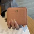 Pink genuine cowhide leather short wallet for women, compact design with metal H clasp. - Pink