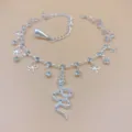 Silver rhinestone snake anklet with cute bows and pearl detail for women sparkling fashion. - Silver