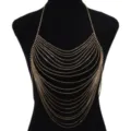 Detailed shot of a stunning multi-layer rhinestone body chain, glittering gold chest chain jewelry. - Chest Chain / Gold