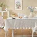 Detailed view of the pastoral style cotton jacquard tablecloth with floral print and ruffles. - 90x90 / Elegant Blue Flower with Ruffle Edge