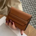 Brown leather minimalist card holder, compact multi-slot mini wallet for women variant view - Caramel color