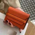 Orange genuine leather card holder for women, minimalist mini wallet with multiple slots. - Orange