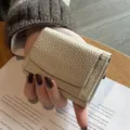Minimalist genuine leather trifold wallet for women, compact mini coin purse with RFID block. - Off White