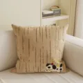 Gemütliches Kissen in Beige mit niedlichem Zeichentrickhund und Streifen für das Sofa. - Gepflegter Hund