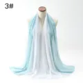 Elegant light blue and white gradient chiffon scarf hijab wrap on a mannequin torso - White and Lake Green