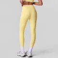 Damen gelbe High Waist Yoga Leggings mit kontrastierenden weißen Linien für Sport. - S / Unterteile / Creme