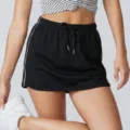 Black athletic sports skirt with white side stripes, built-in anti-glare lining, elastic drawstring waist. - S / Bottoms / Black