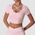 Roze yoga crop top met contrasterende bandjes en borstkussens, fitness sportshirt. - Roze