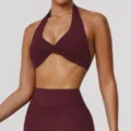 Women's halter neck yoga bra top with stylish front twist design, perfect for gym fitness workouts. - Burgundy
