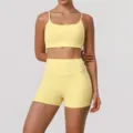 Light yellow athletic set featuring a cropped sports bra and high-waisted yoga shorts for fitness. - XL / Top And Bottom / Yellow